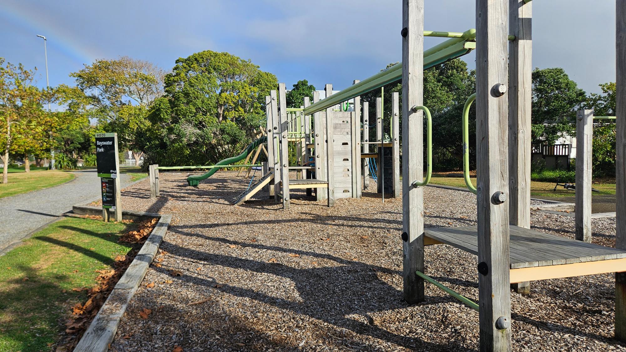 Climbing frames, monkey bars, and play structures at Bayswater Park Playground