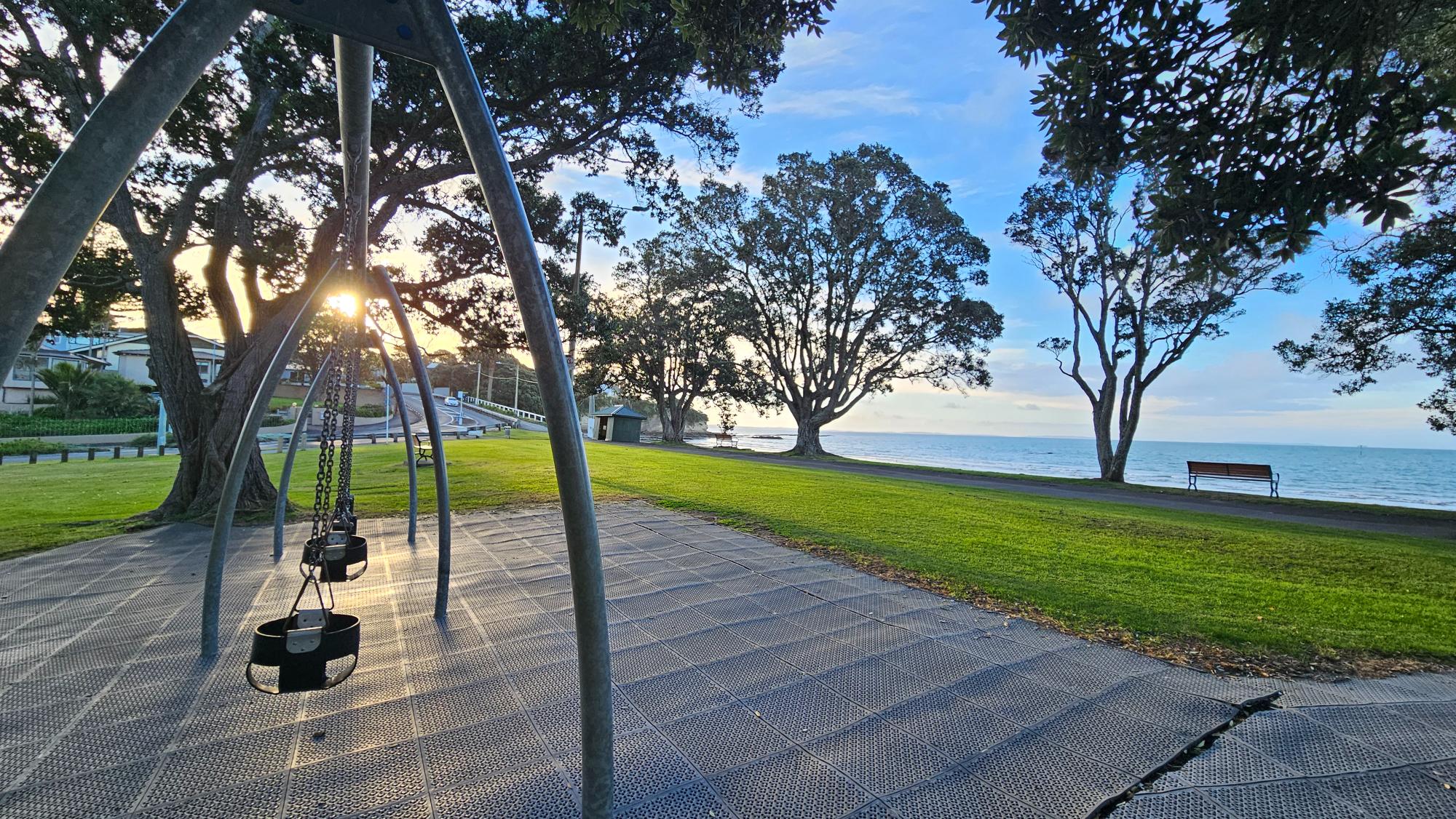 Narrow Neck Beach beside the playground — sand and water steps away
