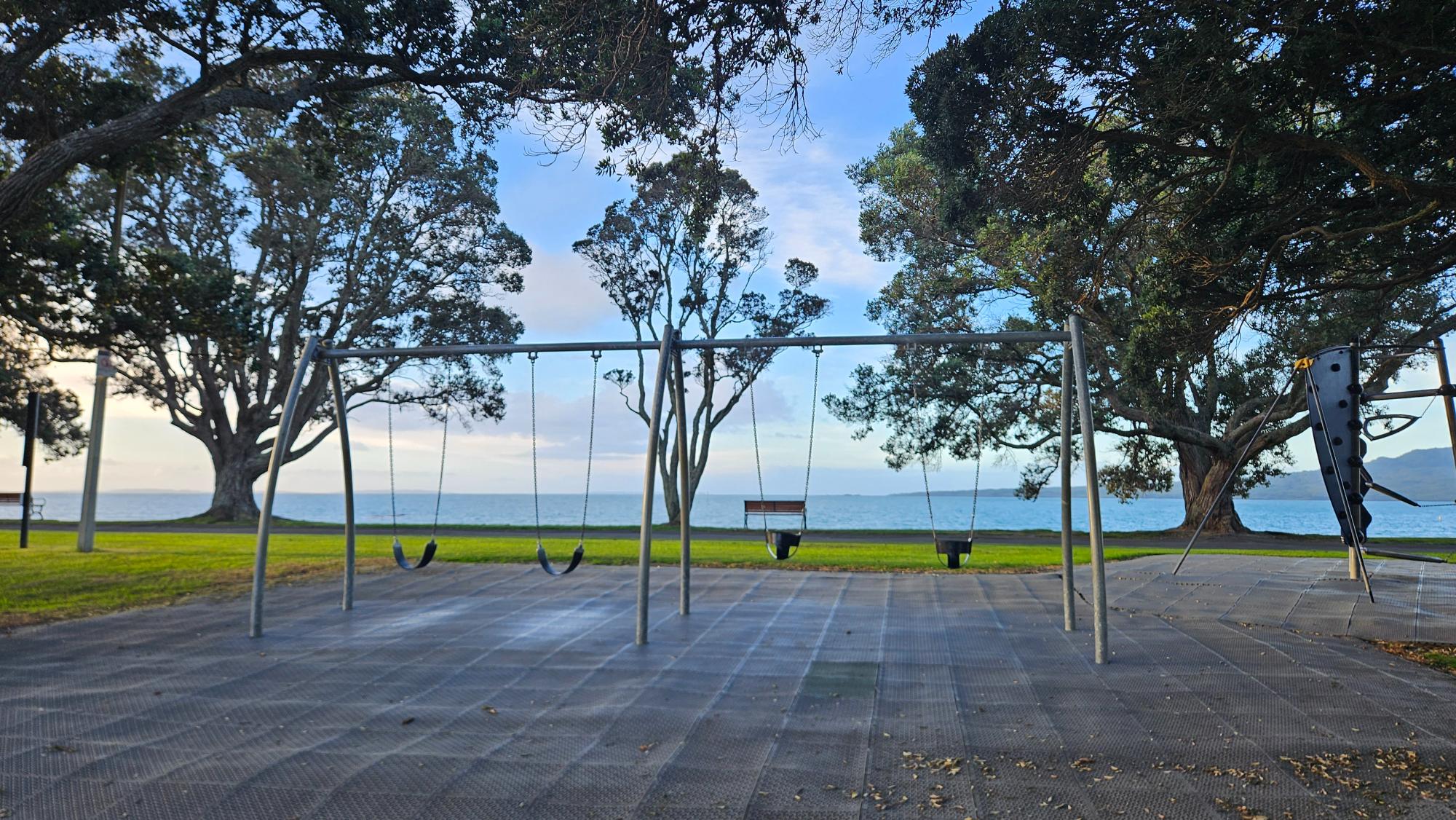 View from the swings toward the water at Narrow Neck Beach