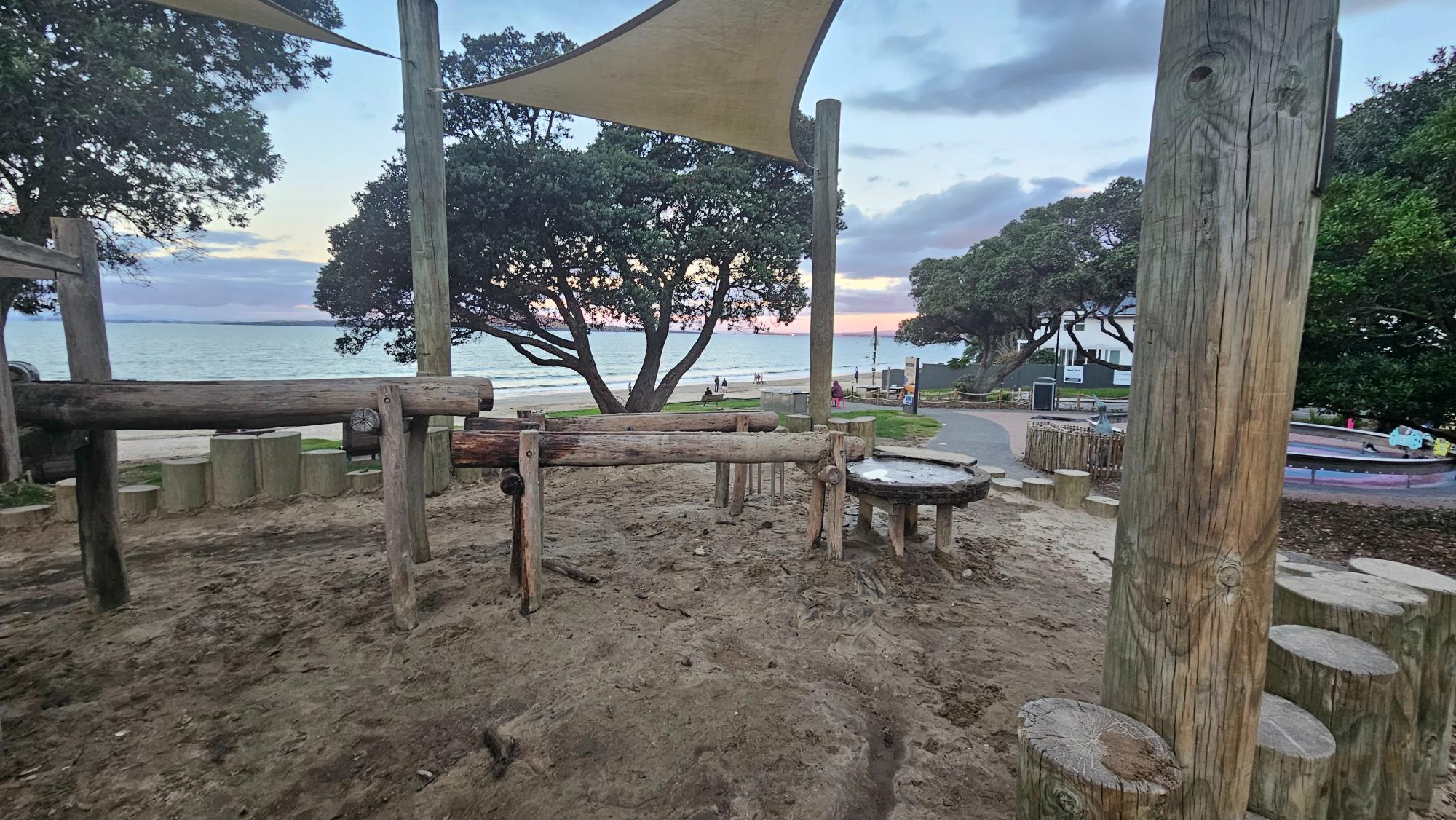 Toddler area — sandpit and a small dedicated water-play setup