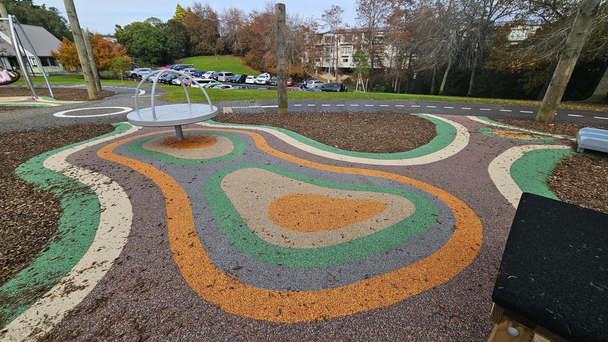 The toddler area has a floor that is mostly made of soft rubber material.