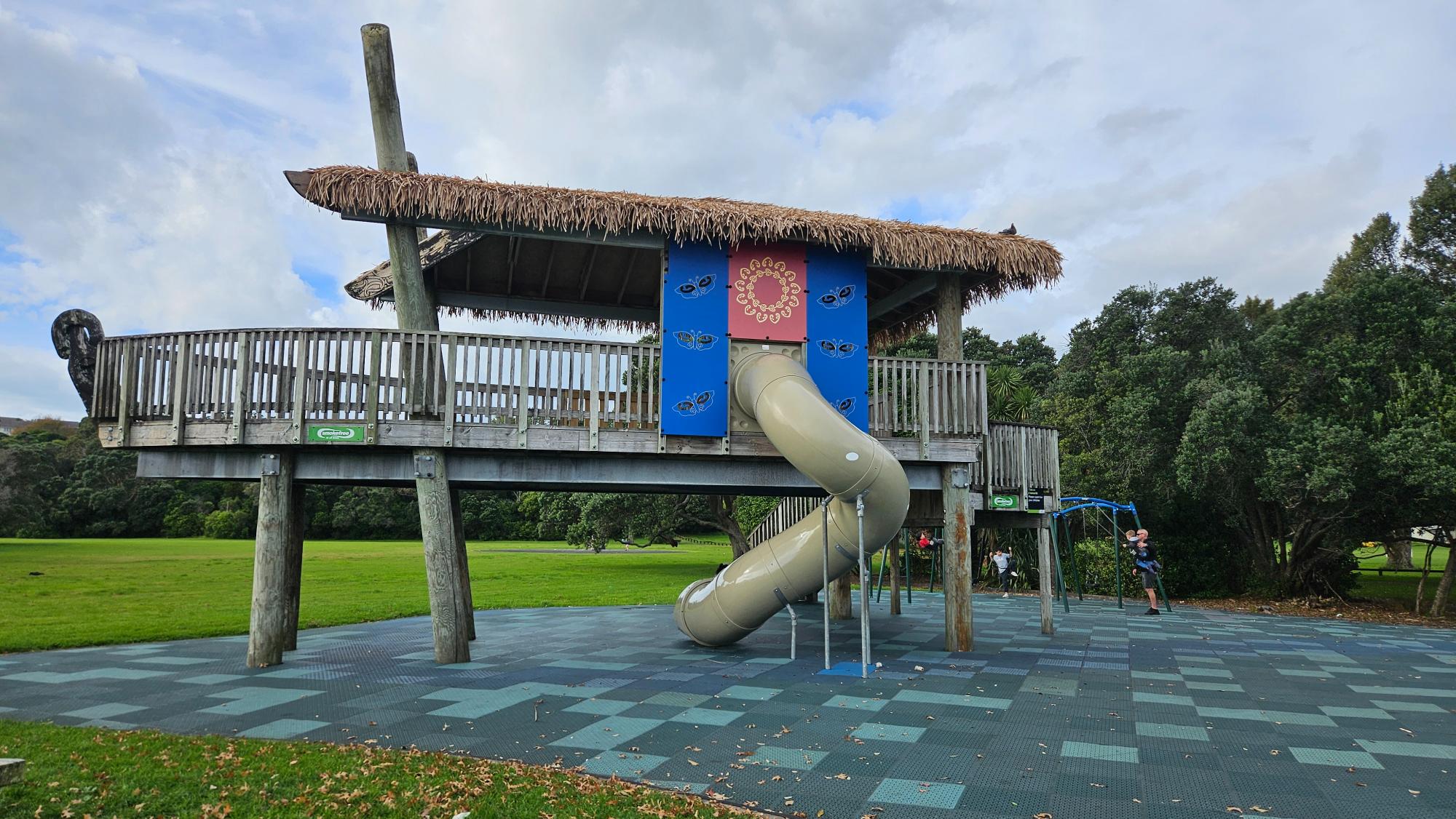 Ōrākei Domain Playground — waka-themed main structure and vast domain lawns