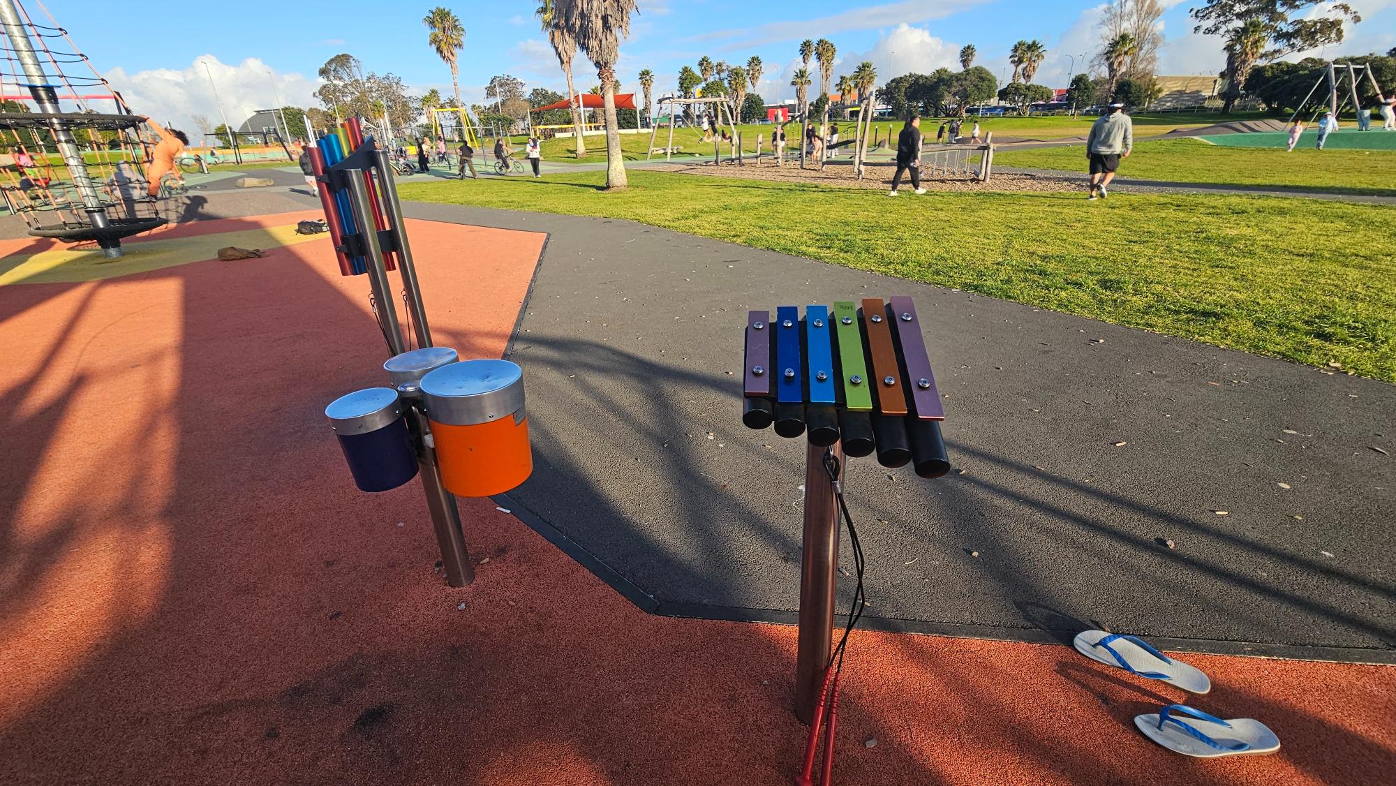 Fun outdoor instruments — a small xylophone, drums, and more