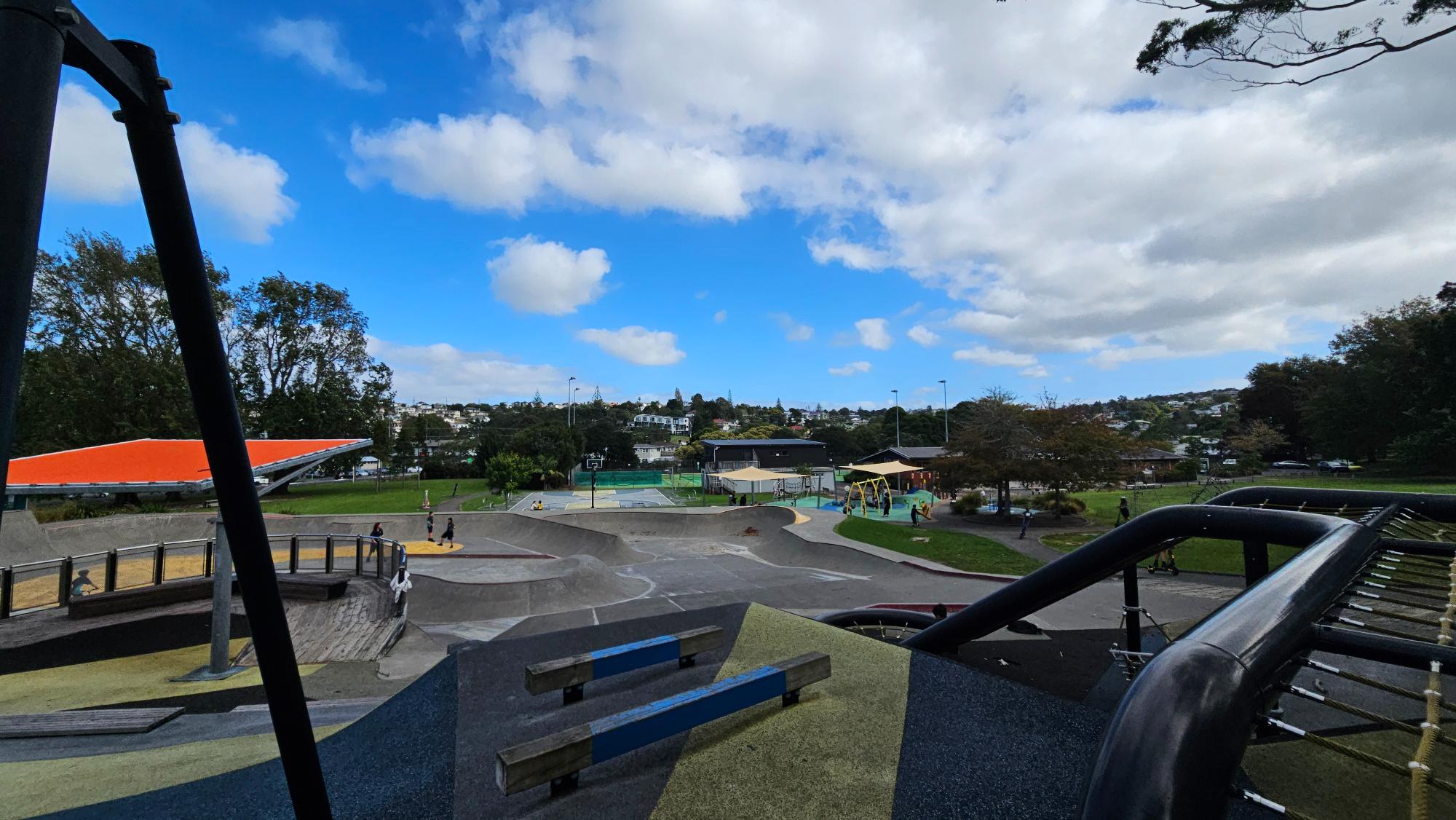 The wider park stretches well beyond the playground — open grounds with room to run, ride, and make a full afternoon of it