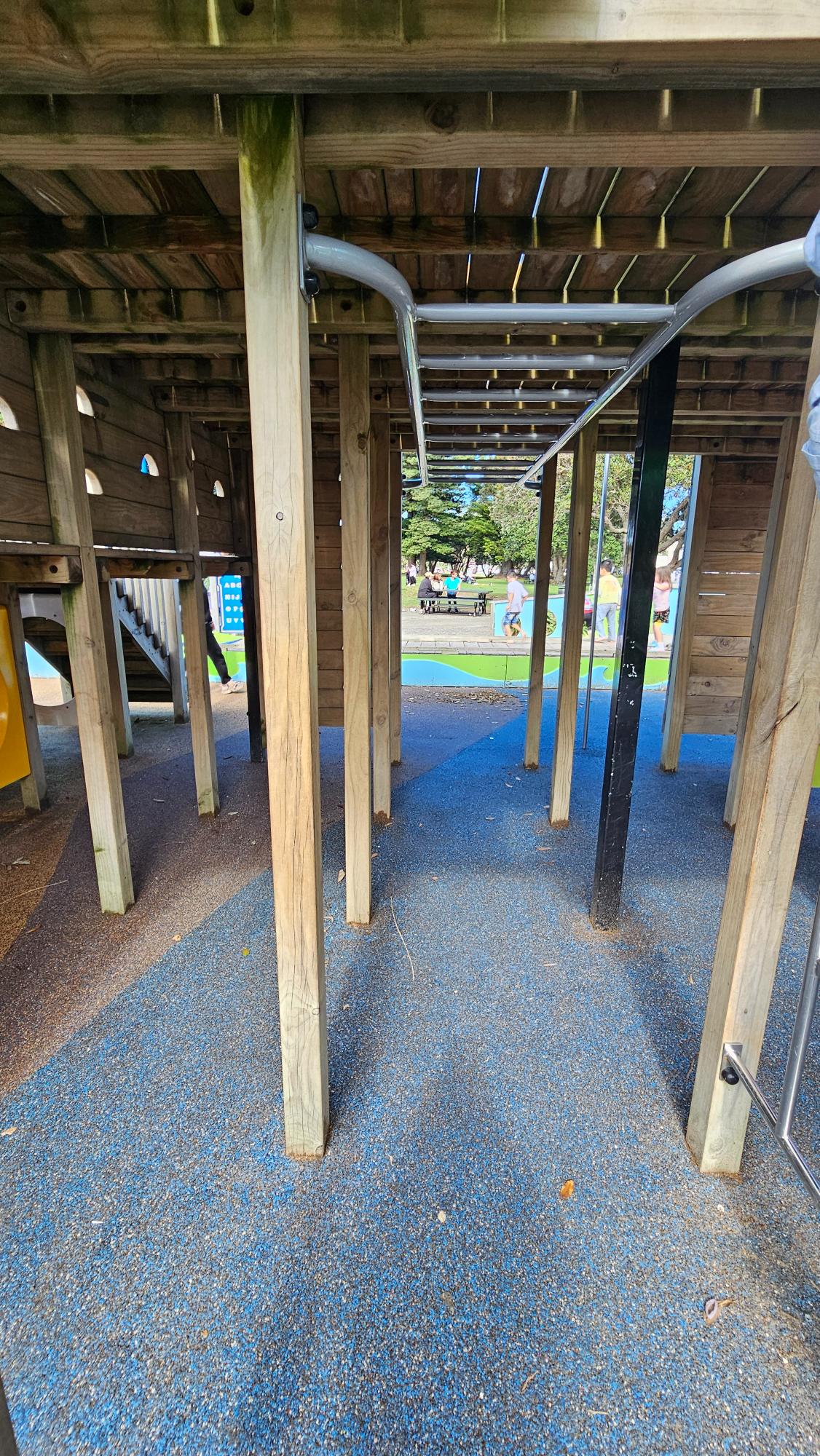 A hidden monkey bar just underneath the slide.