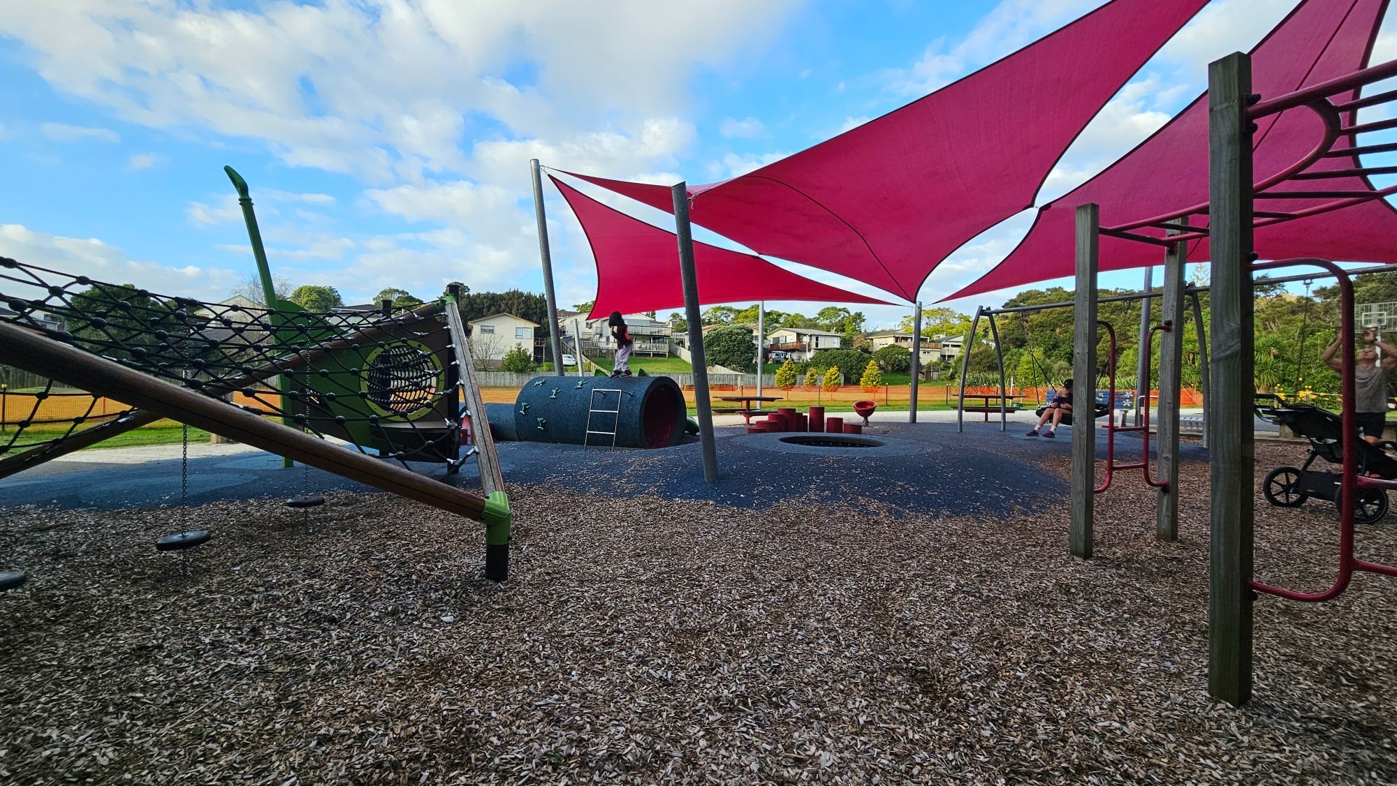 Rope climbing and play structure under shade sails at Lynn Reserve