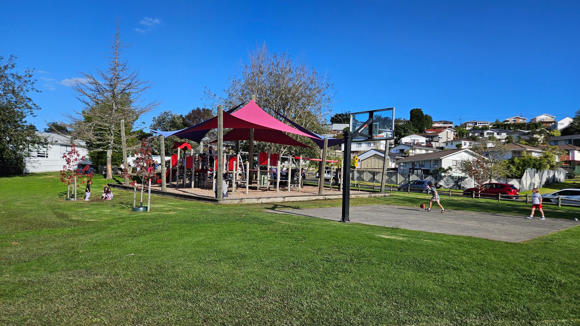 Rewi Alley Reserve Playground overview with open green space