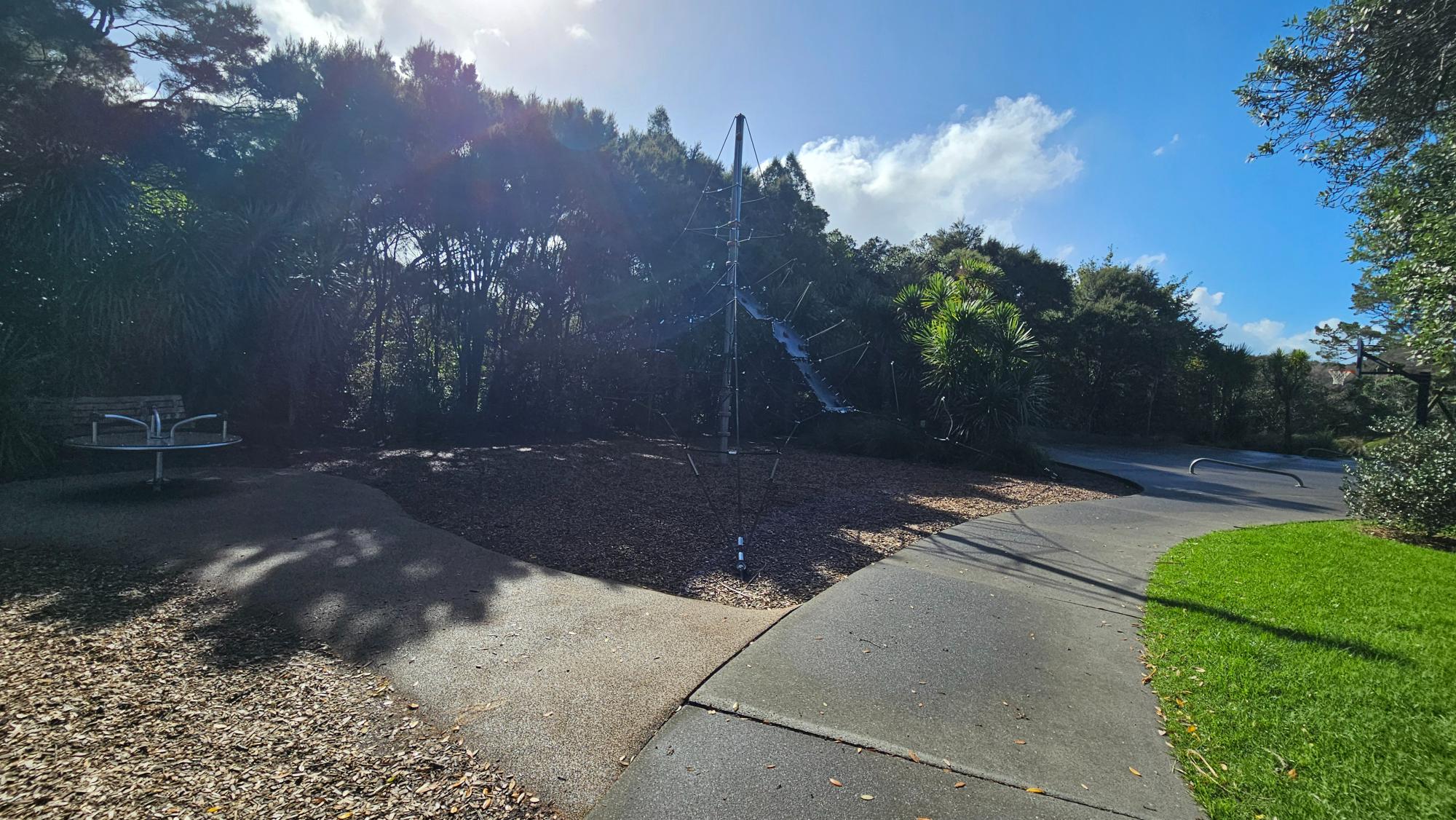 Spider rope net at Tui Park Playground. It's hard to tell from the photo (because of the sunlight), but the gaps between the ropes looked wider than the ones on the rope nets elsewhere.
