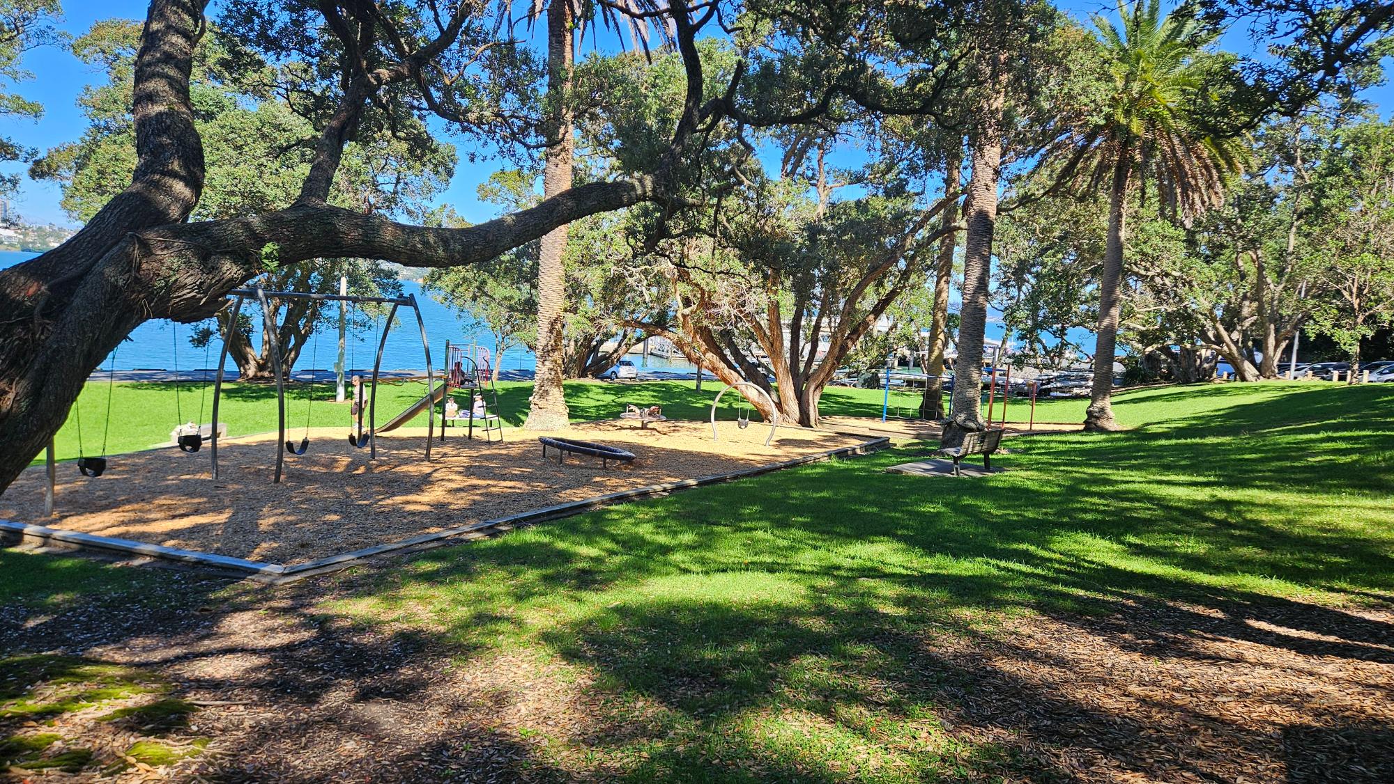Hinemoa Park Playground beside Birkenhead Wharf with harbour and city outlook