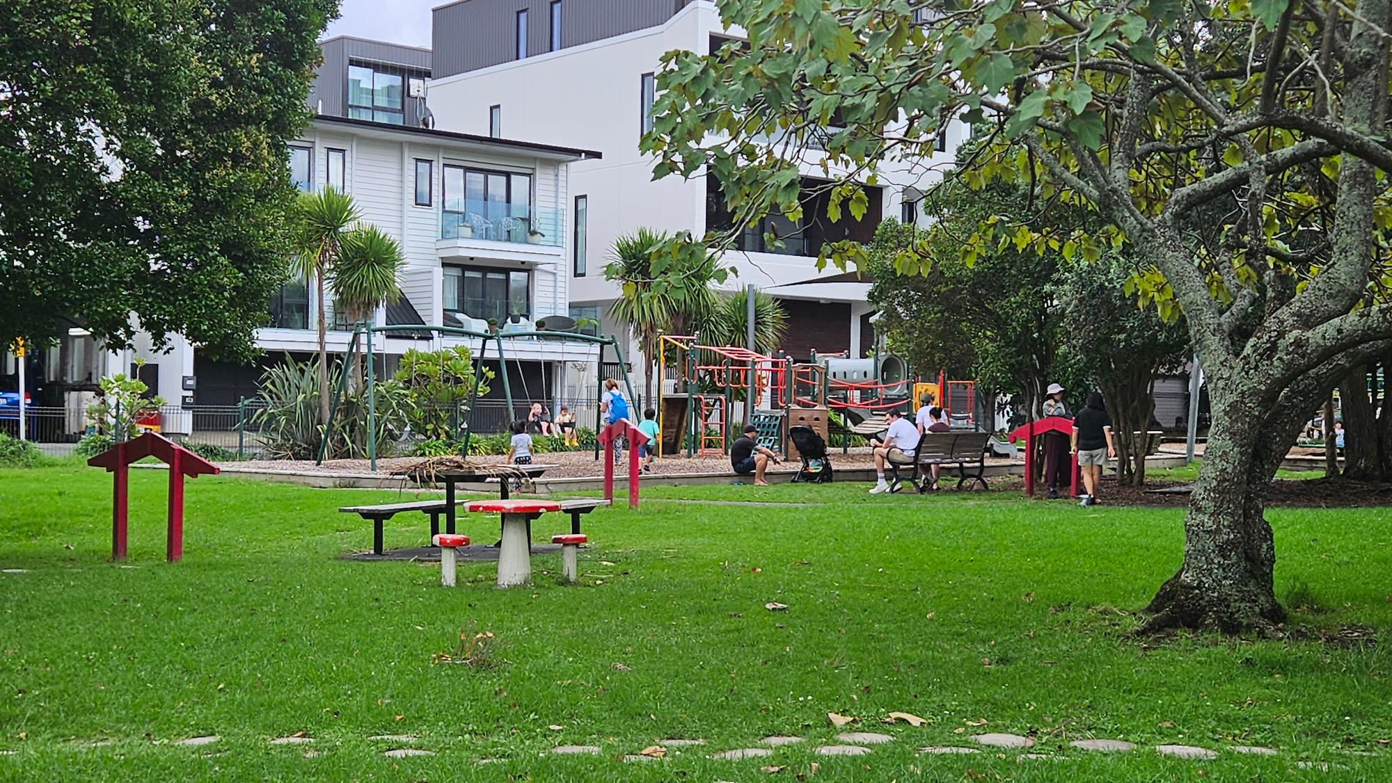 Main play area with fenced boundary and open surrounding space