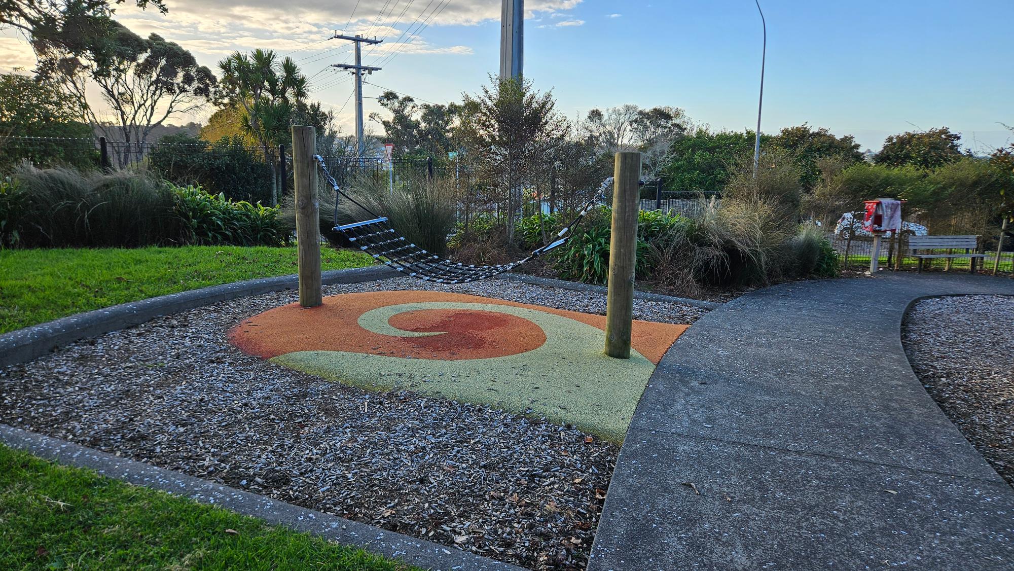 A small hammock set up next to the toddler area