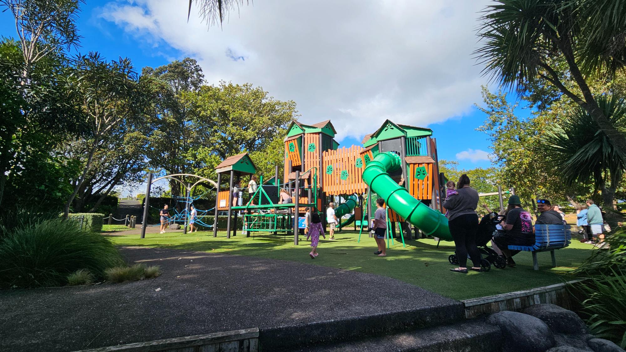 Main climbing structures and busy play zone at Hamilton Lake Playground