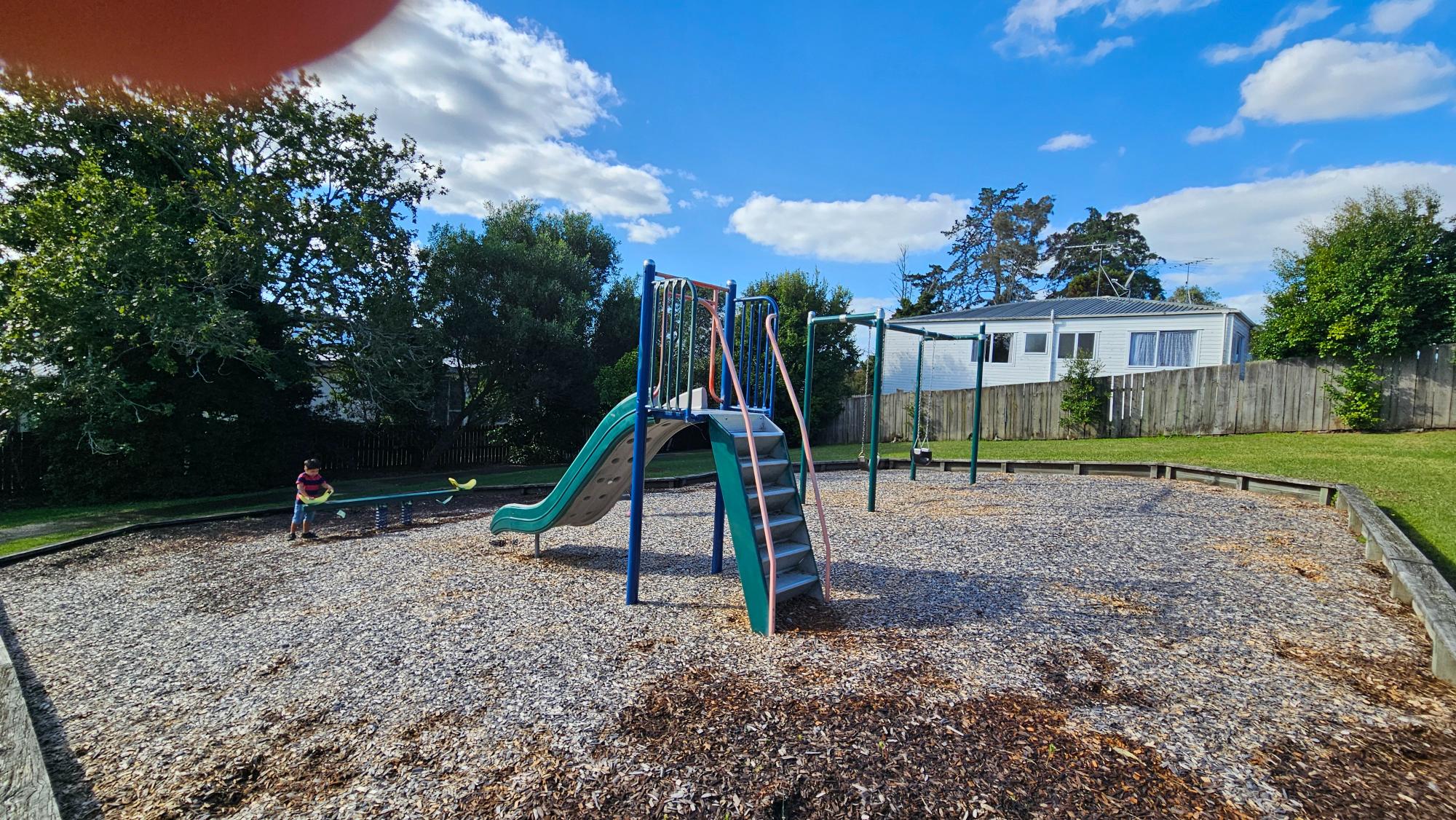 Simple toddler-focused play equipment at Celeste Reserve Playground
