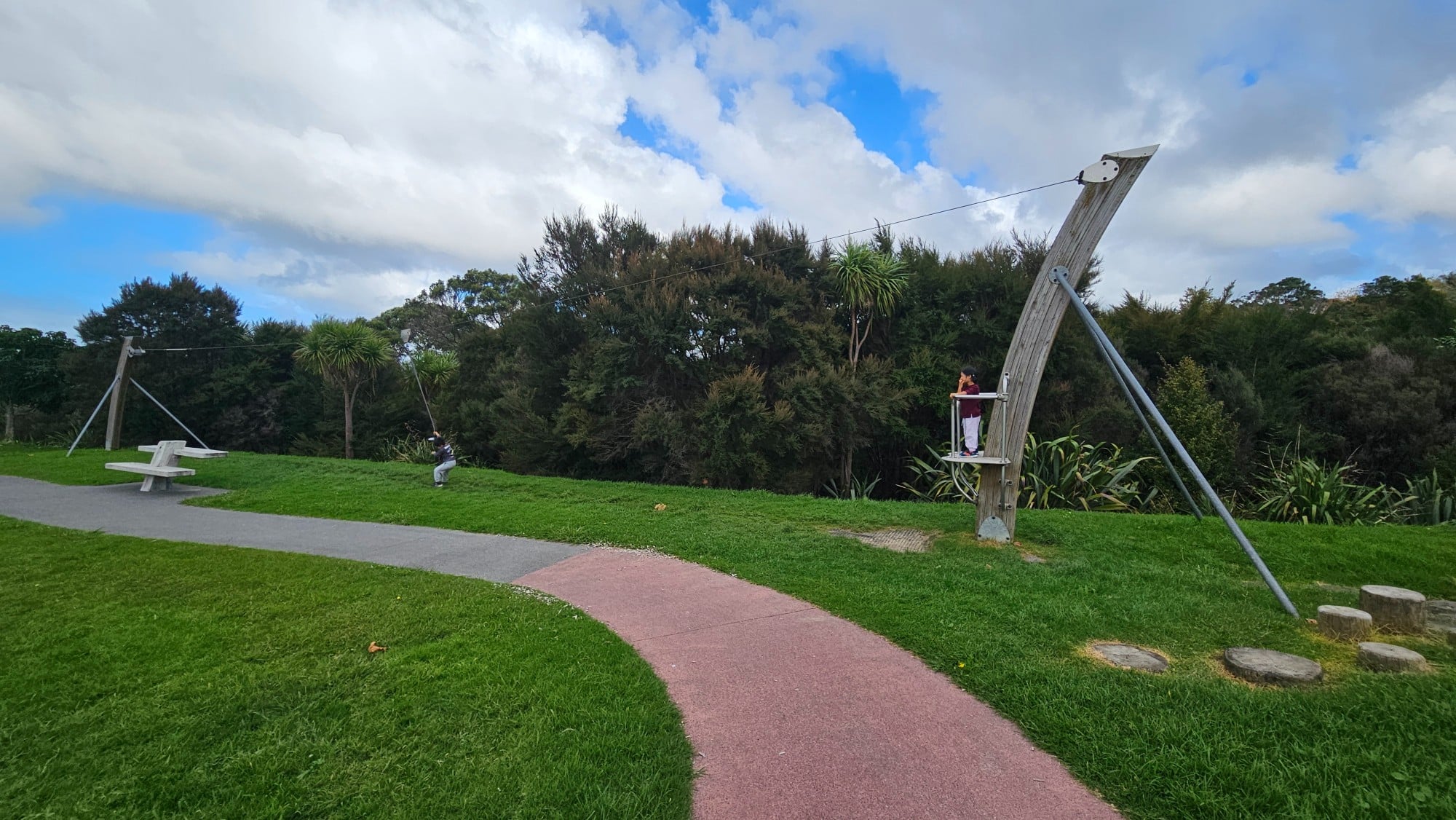 A flying fox at Harrowglen Drive Playground. You have to climb a small ladder to get onto it, which makes it even more exciting for kids.