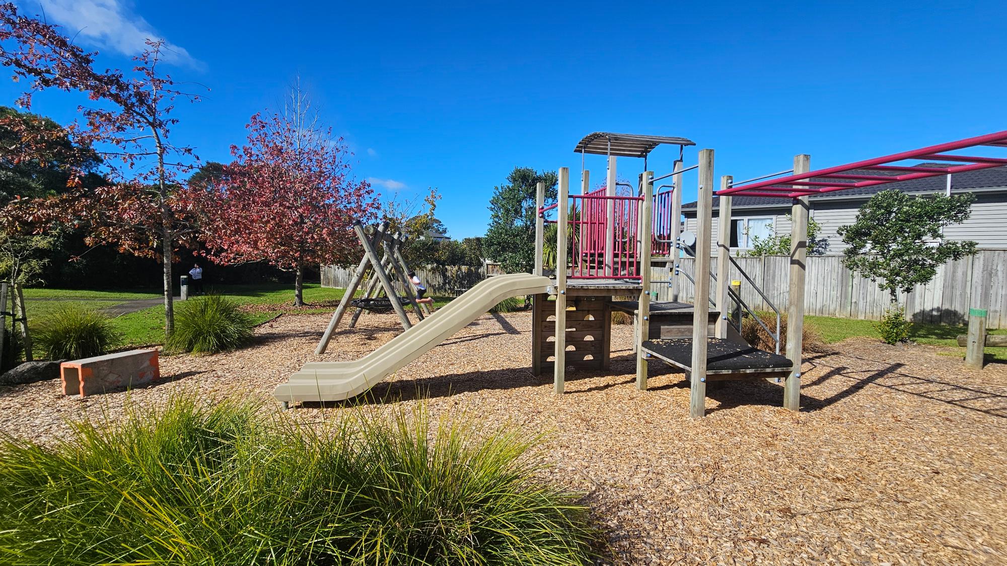 Monkey bars and slides at Wanita Reserve, Totara Vale