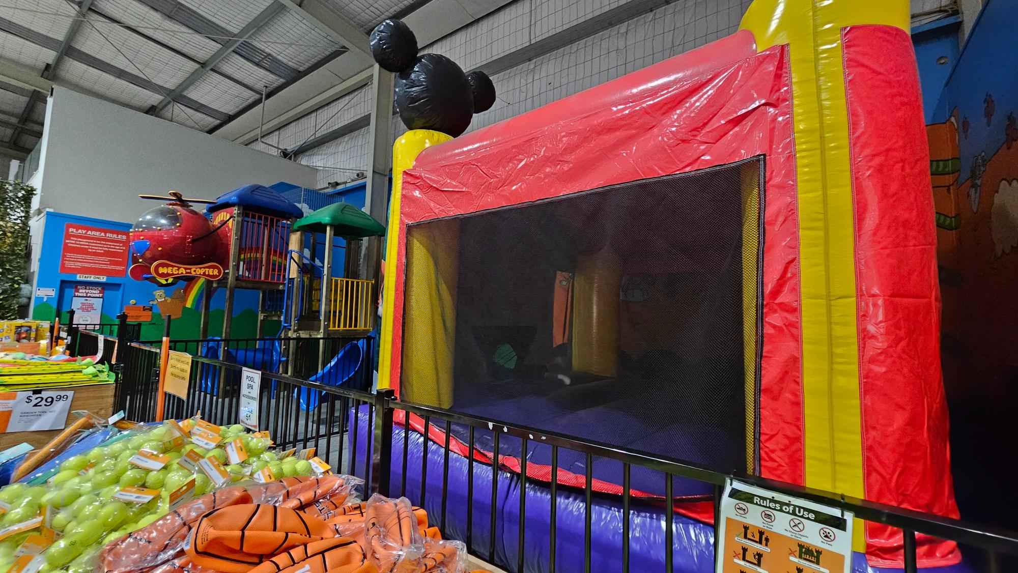 Air bouncer beside the play equipment at Mitre 10 MEGA Glenfield