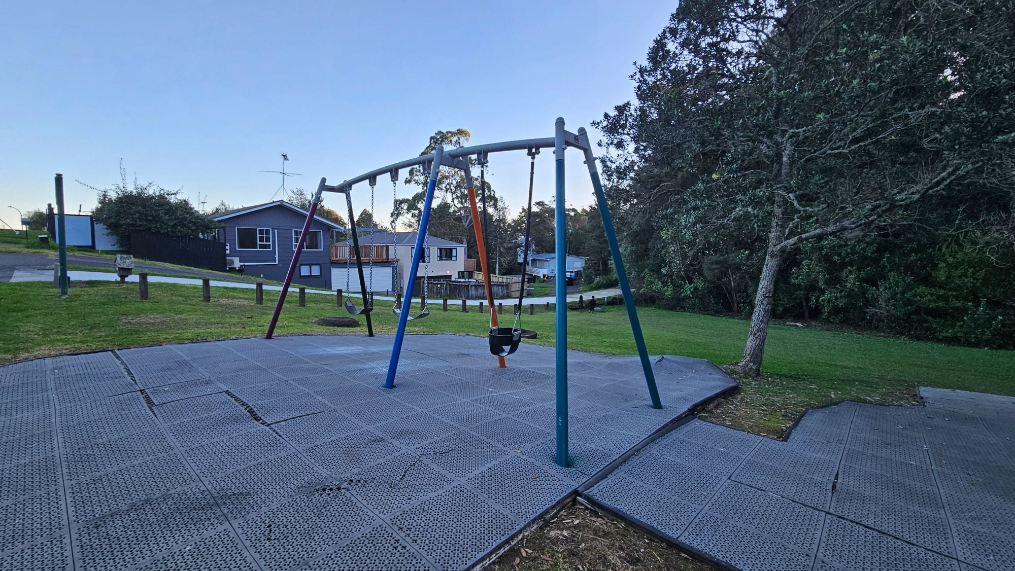 Green, blue, and purple accents on the play structure