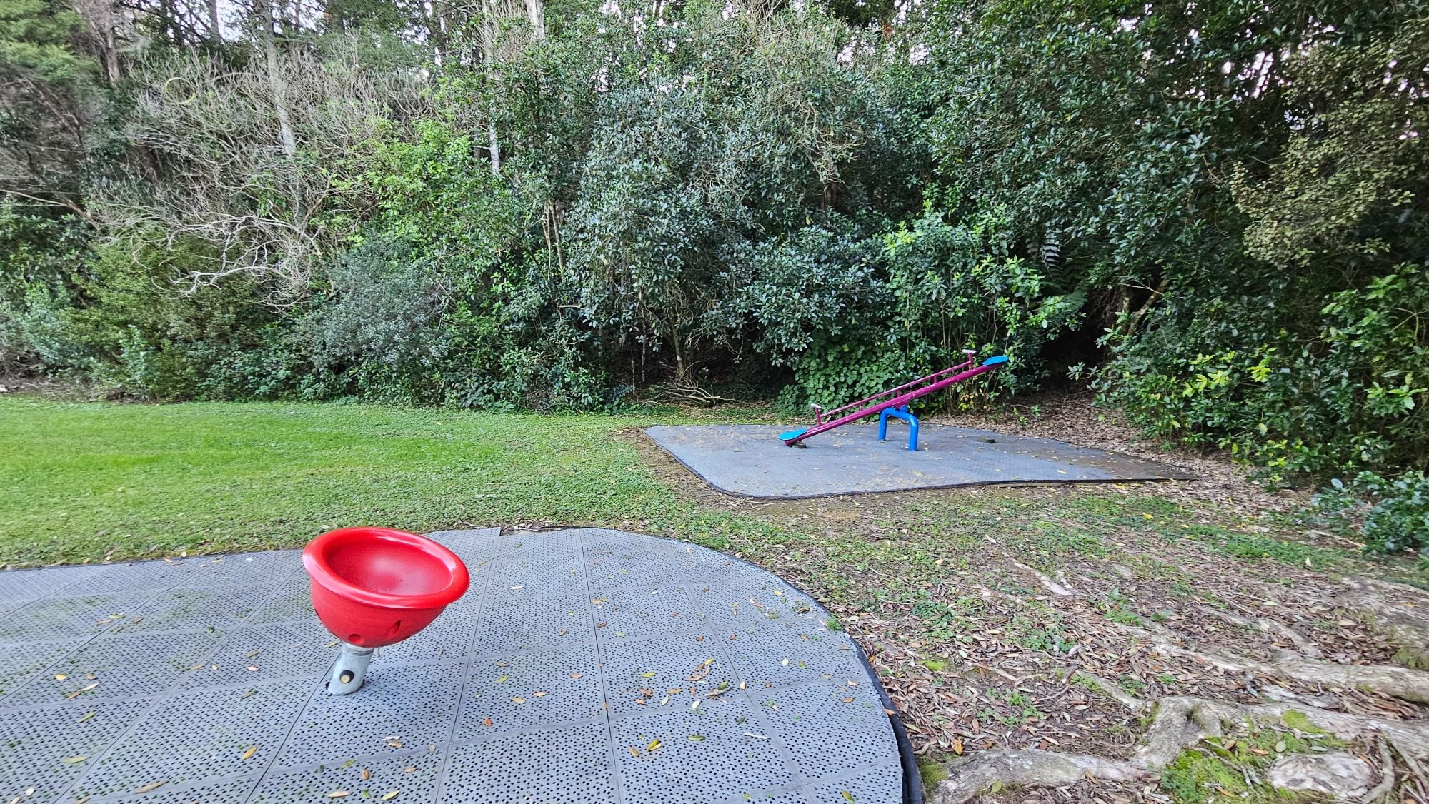 Behind the playground lies a small wooded area..  it has a slightly eerie feel.