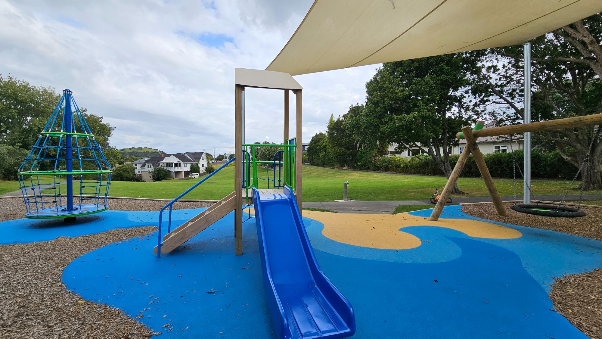 Small slide and toddler-friendly play at Achilles Crescent Reserve Playground