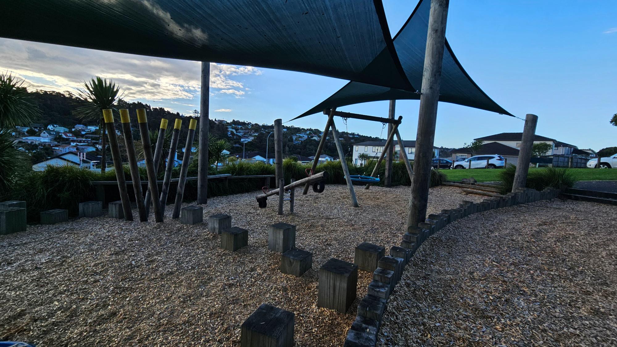 Wooden jumping blocks among the play space at Tamahere Reserve Playground